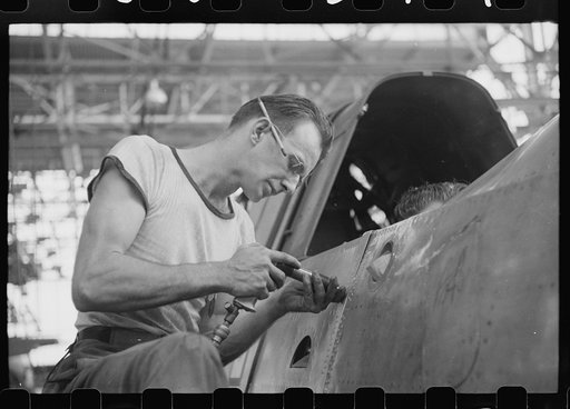 Nashville, Tennessee. Vultee Aircraft Company. Riveting a fuselage on a sub-assembly line