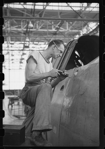 Nashville, Tennessee. Vultee Aircraft Company. Riveting a fuselage on a sub-assembly line