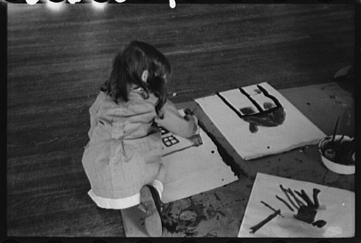 Wilmington, Delaware. Tower Hill School, noted country day school for pupils from three to eighteen years of age. A small girl working on the floor in an art class