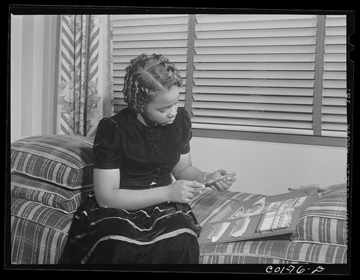 Jelna likes sciences, is going to be a doctor. For Christmas her parents bought her this chemistry set. Ida B. Wells Housing Project, Chicago, Illinois