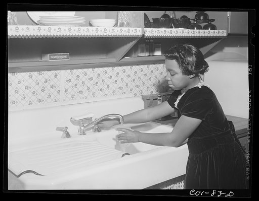 In the kitchen of the Carr home. Ida B. Wells Housing Project, Chicago, Illinois