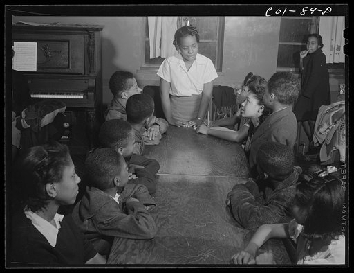 Jelna Carr opening the meeting of the Wellstown aldermen. Ida B. Wells Housing Project, Chicago, Illinois
