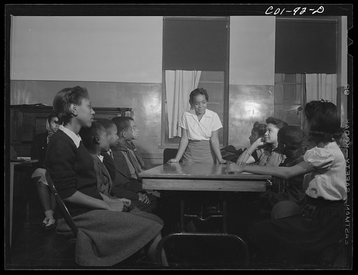 Jelna Carr opening the meeting of the Wellstown aldermen. Ida B. Wells Housing Project, Chicago, Illinois