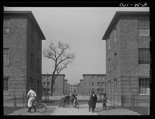 General views of the houses showing play areas between the rows of houses. Ida B. Wells Housing Project, Chicago, Illinois