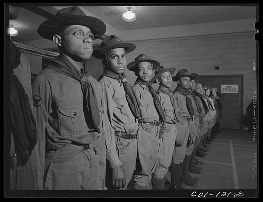 Some of the scouts of Troop 446 who meet in the community center of the Ida B. Wells Housing Project. Chicago, Illinois (Boy Scout meeting)
