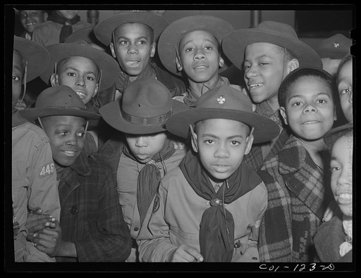 Some of the scouts of Troop 446 who meet in the community center of the Ida B. Wells Housing Project. Chicago, Illinois (Boy Scout meeting)