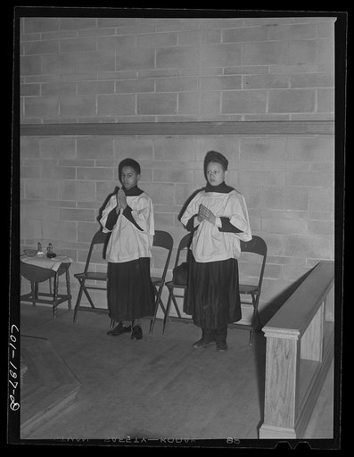 Altar boys at a Negro Catholic church on the South Side. Chicago, Illinois