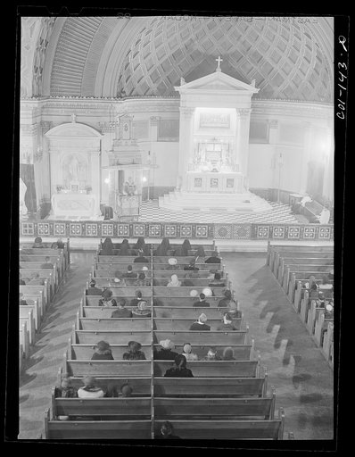 Untitled photo, possibly related to: Sunday Mass at the Corpus Christi Catholic church. The pastor, Father Refinus, is white, but ninety-eight percent of the population is colored. The total church membership is over 2,000. Chicagi, Illinois