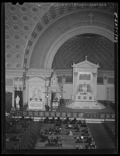 Untitled photo, possibly related to: Sunday Mass at the Corpus Christi Catholic church. The pastor, Father Refinus, is white, but ninety-eight percent of the population is colored. The total church membership is over 2,000. Chicagi, Illinois