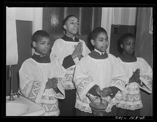 Altar boys at Saint Elizabeth's Catholic church. South Side, Chicago, Illinois