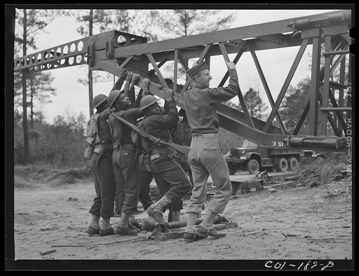 Untitled photo, possibly related to: Fort Bragg, North Carolina. 41st Engineers building a bridge