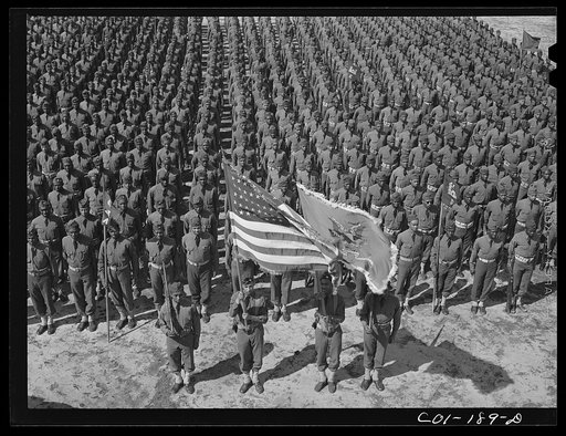 Untitled photo, possibly related to: Fort Bragg, North Carolina. 41st Engineers on parade with Sergeant Franklin Williams in color guard