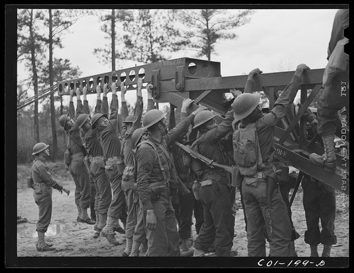 Untitled photo, possibly related to: Fort Bragg, North Carolina. 41st Engineers building a bridge