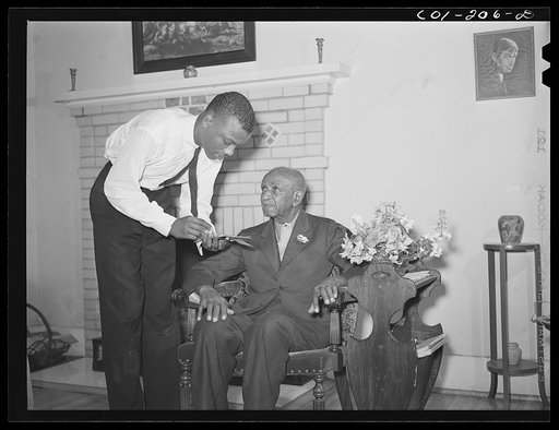 Untitled photo, possibly related to: Tuskegee Institute, Alabama. Dr. George Washington Carver talks to members of Reserve Officers Training Corps