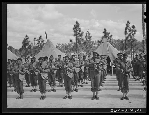 Untitled photo, possibly related to: Fort Bragg, North Carolina. Company J, 41st Engineers, in gas mask drill