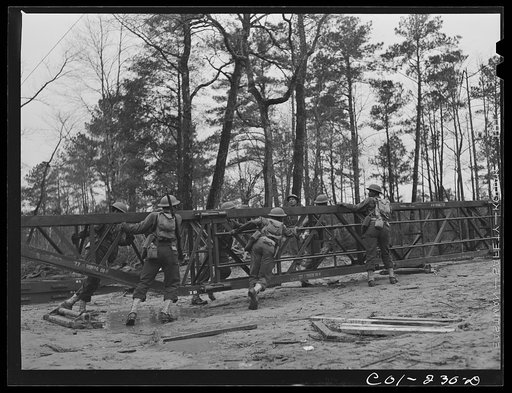 Untitled photo, possibly related to: Fort Bragg, North Carolina. 41st Engineers building a bridge