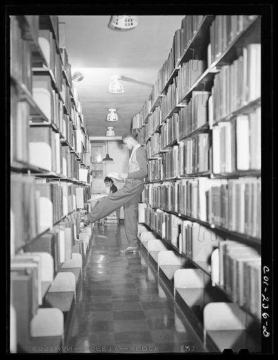 Untitled photo, possibly related to: Atlanta University, Atlanta, Georgia. Students in library stacks