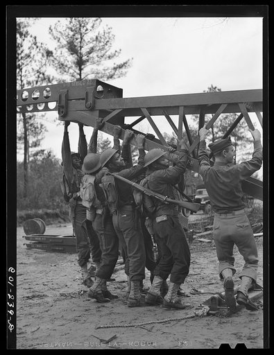 Untitled photo, possibly related to: Fort Bragg, North Carolina. 41st Engineers building a bridge