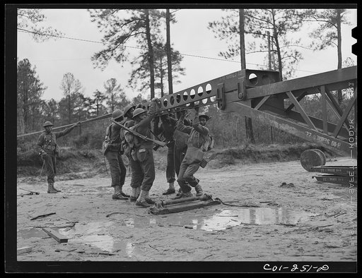 Untitled photo, possibly related to: Fort Bragg, North Carolina. 41st Engineers building a bridge