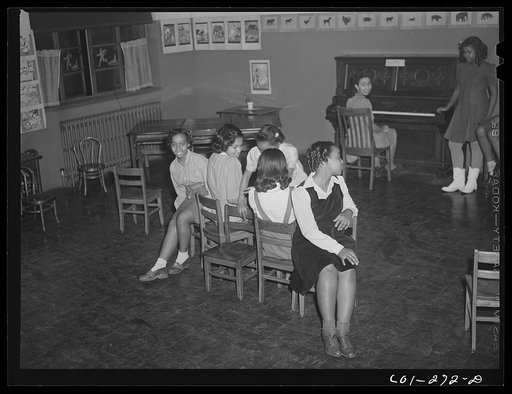 Untitled photo, possibly related to: Chicago, Illinois. Ida B. Wells Housing Project. Children playing a game in a music class