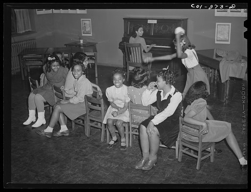 Untitled photo, possibly related to: Chicago, Illinois. Ida B. Wells Housing Project. Children playing a game in a music class
