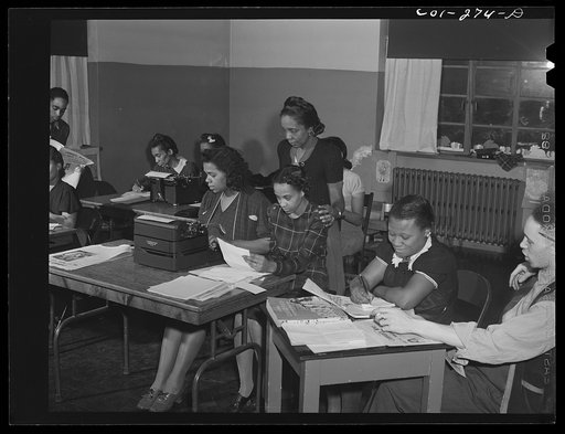 Chicago, Illinois. Ida B. Wells Housing Project. Working on the community newspaper