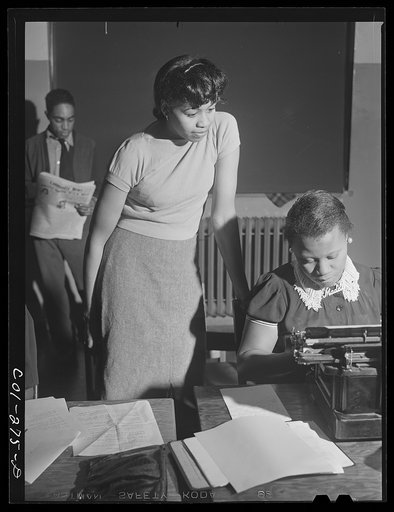 Chicago, Illinois. Ida B. Wells Housing Project. Working on community paper
