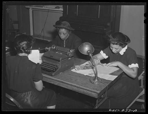 Chicago, Illinois. Ida B. Wells Housing Project. Working on the community newspaper