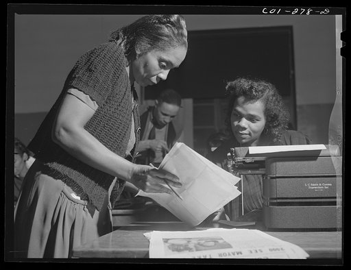 Chicago, Illinois. Ida B. Wells Housing Project. Working on the community newspaper