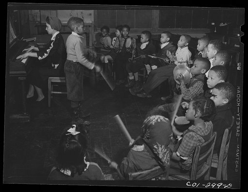 Untitled photo, possibly related to: Chicago, Illinois. Ida B. Wells Housing Project. A childrens' rhythm band in a music class
