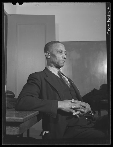 Chicago, Illinois. Ida B. Wells Housing Project. Portrait of a member of a forum discussion group