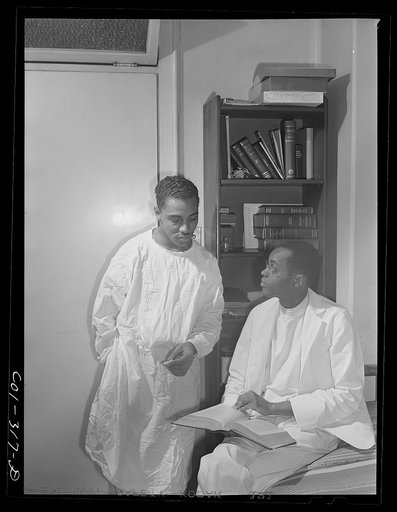 Untitled photo, possibly related to: Chicago, Illinois. Provident Hospital. Dr. S.J. Jackson, left and Dr. E.V. Williams, interns. Dr. Jackson was born in Texas and studied at Meharry Medical College in Nashville, Tenn. Dr. Williams comes from Kansas and was a Phi Beta Kappa at Kansas University