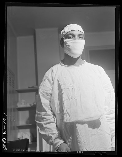 Chicago, Illinois. Provident Hospital. Dr. S.J. Jackson, intern, ready to go into the operating room to assist in an operation