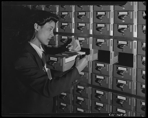 Untitled photo, possibly related to: Washington, D.C. Jewal [i.e. Jewel] Mazique on temporary duty checking filing systems in the Library of Congress