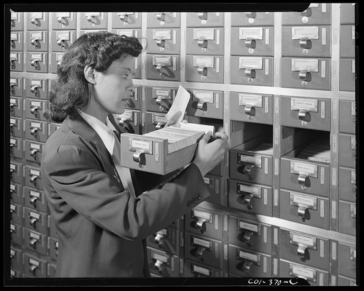 Washington, D.C. Jewal [i.e. Jewel] Mazique on temporary duty checking filing systems in the Library of Congress