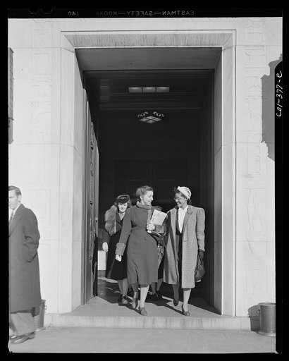 Washington, D.C. Jewal Mazique [i.e. Jewel] leaving work with a colleague from the Library of Congress annex