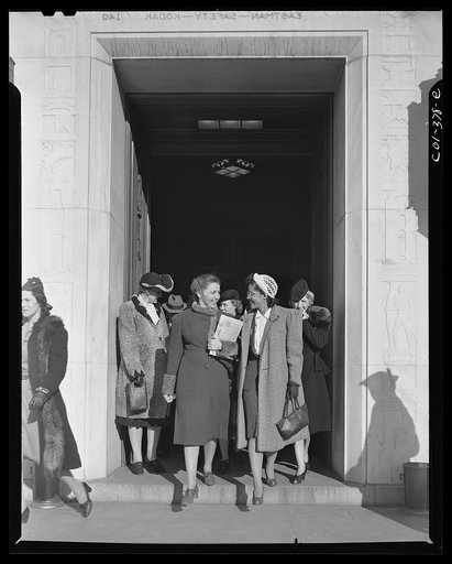 Washington, D.C. Jewal Mazique [i.e. Jewel] leaving work with a colleague from the Library of Congress annex