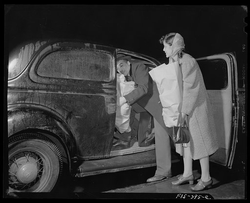 Washington, D.C. Jewal Mazique [i.e. Jewel], worker at the Library of Congress, and her husband shopping