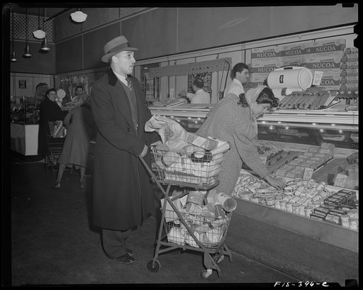 Washington, D.C. Jewal Mazique [i.e. Jewel], worker at the Library of Congress, and her husband shopping