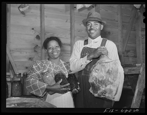 Zebulon, North Carolina. Feggen Jones and wife in the smokehouse