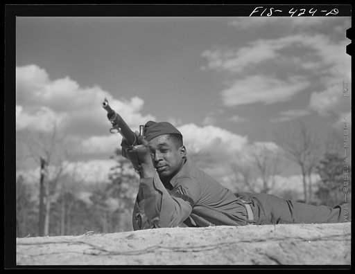 Fort Bragg, North Carolina. Sergeant Williams receiving marksmanship lessons