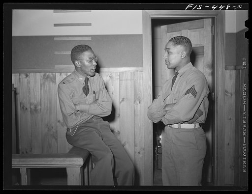 Fort Bragg, North Carolina. Sergeant Williams talking to the regimental chaplain (Edward Carroll)