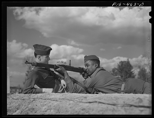 Fort Bragg, North Carolina. Sergeant Franklin Williams receiving lessons in marksmanship