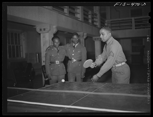 Untitled photo, possibly related to:  Fort Bragg, North Carolina. Sergeant Williams playing ping-pong in the service club