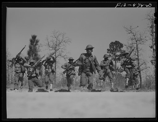 Untitled photo, possibly related to: Fort Bragg, North Carolina. Sergeant Williams leading his platoon in charge