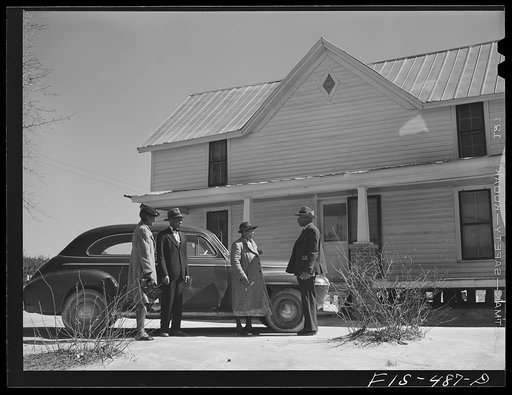 Untitled photo, possibly related to: Zebulon, North Carolina. Feggen Jones and family leaving for church