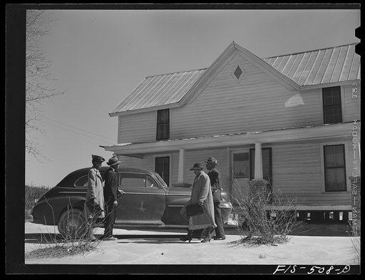 Zebulon, North Carolina. Feggen Jones and family leaving for church