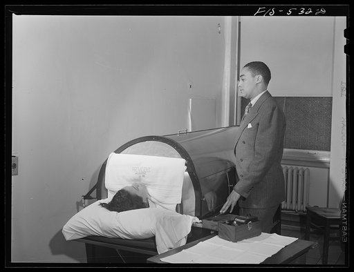 Chicago, Illinois. Provident Hospital. Dr. Harold Thatcher administering fever therapy to a patient