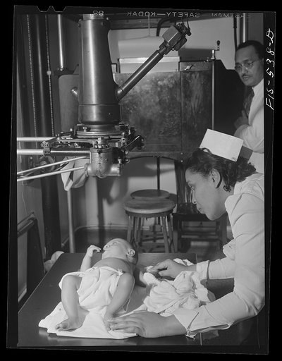 Chicago, Illinois. Provident Hospital. Making an x-ray of a child