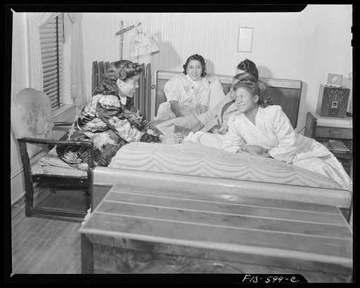 Untitled photo, possibly related to: Washington, D.C. Jewal Mazique [i.e. Jewel], worker at the Library of Congress, spends much of her time reading